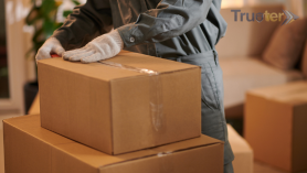 Professional mover loading boxes